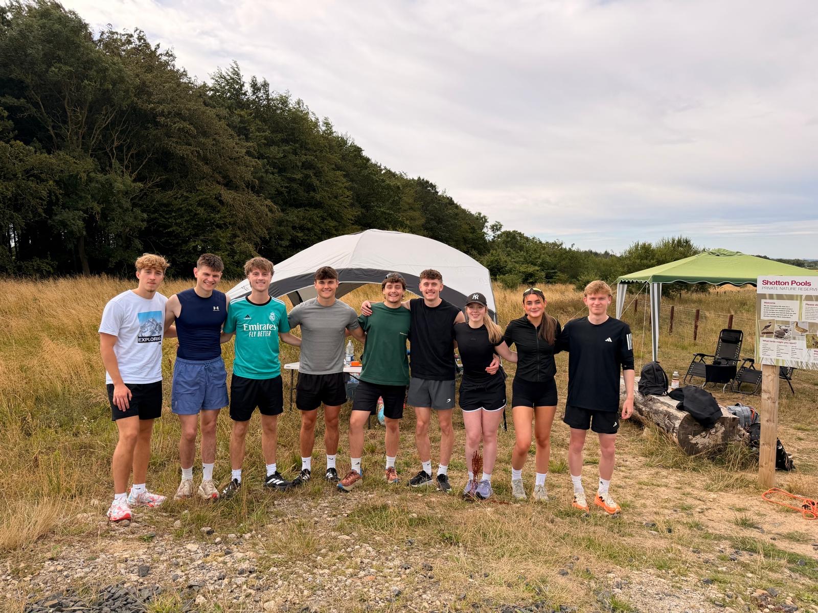 The group at the backyard ultra aid station